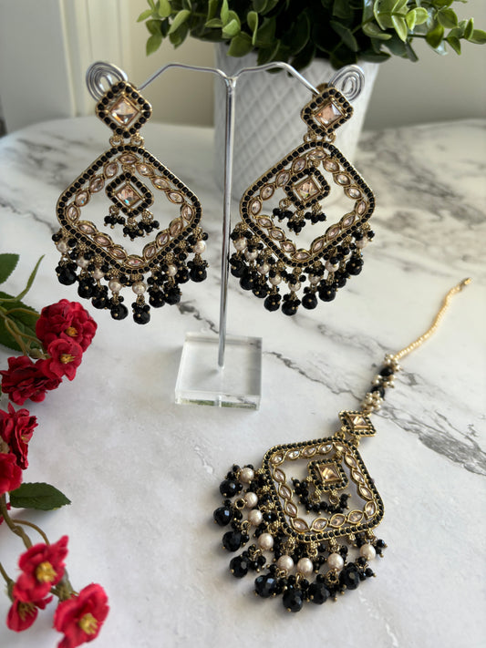 Black polki earrings and tikka